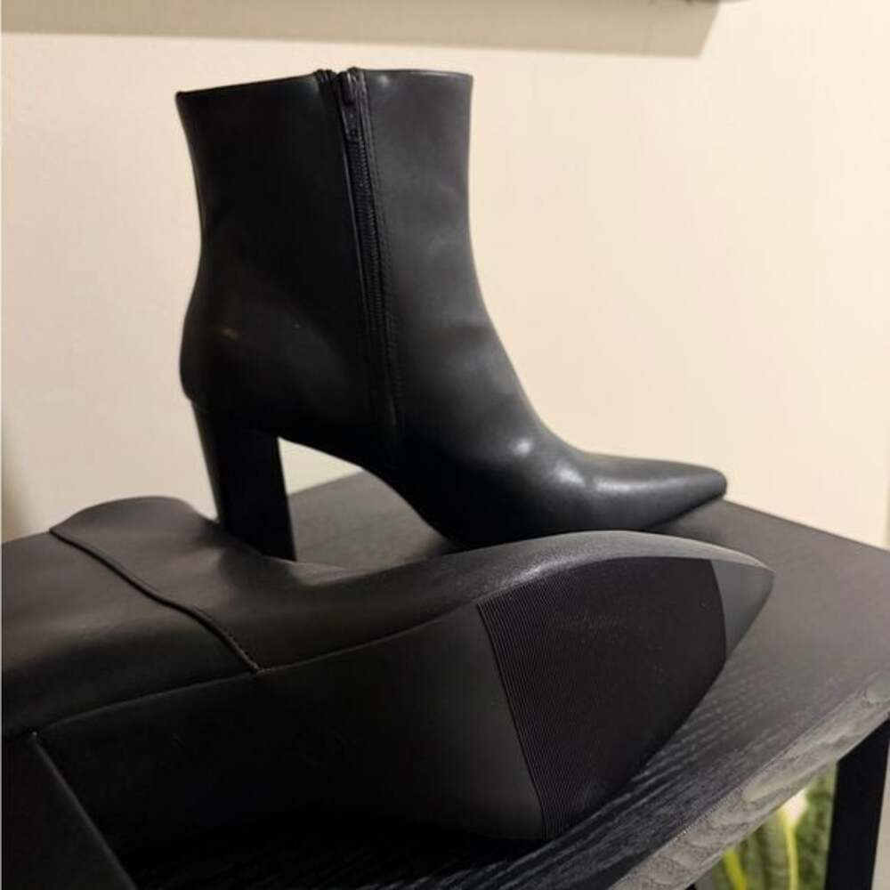 Sleek Black Heeled Boots